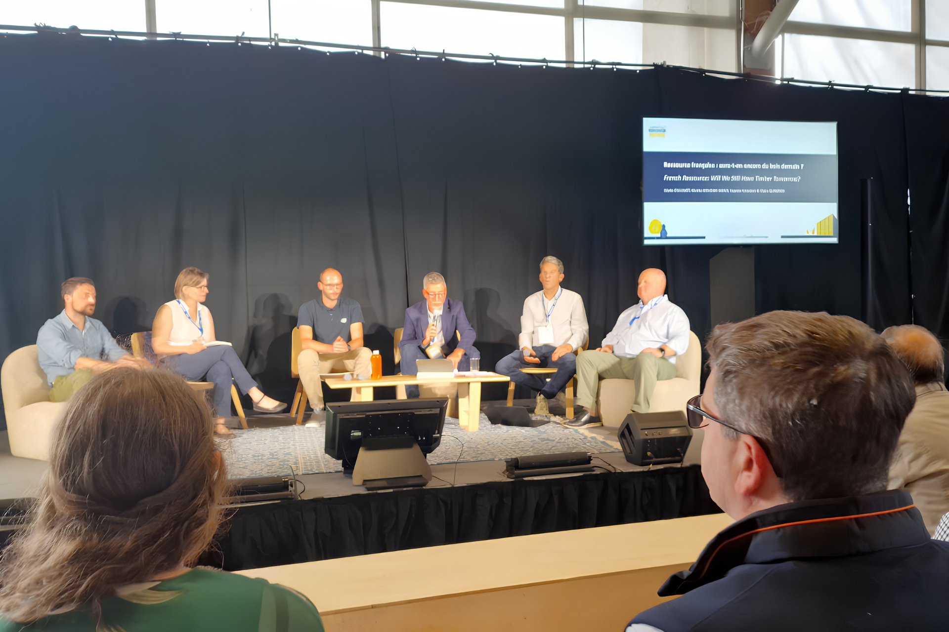 Exchanging ideas with industry professionals during the event.