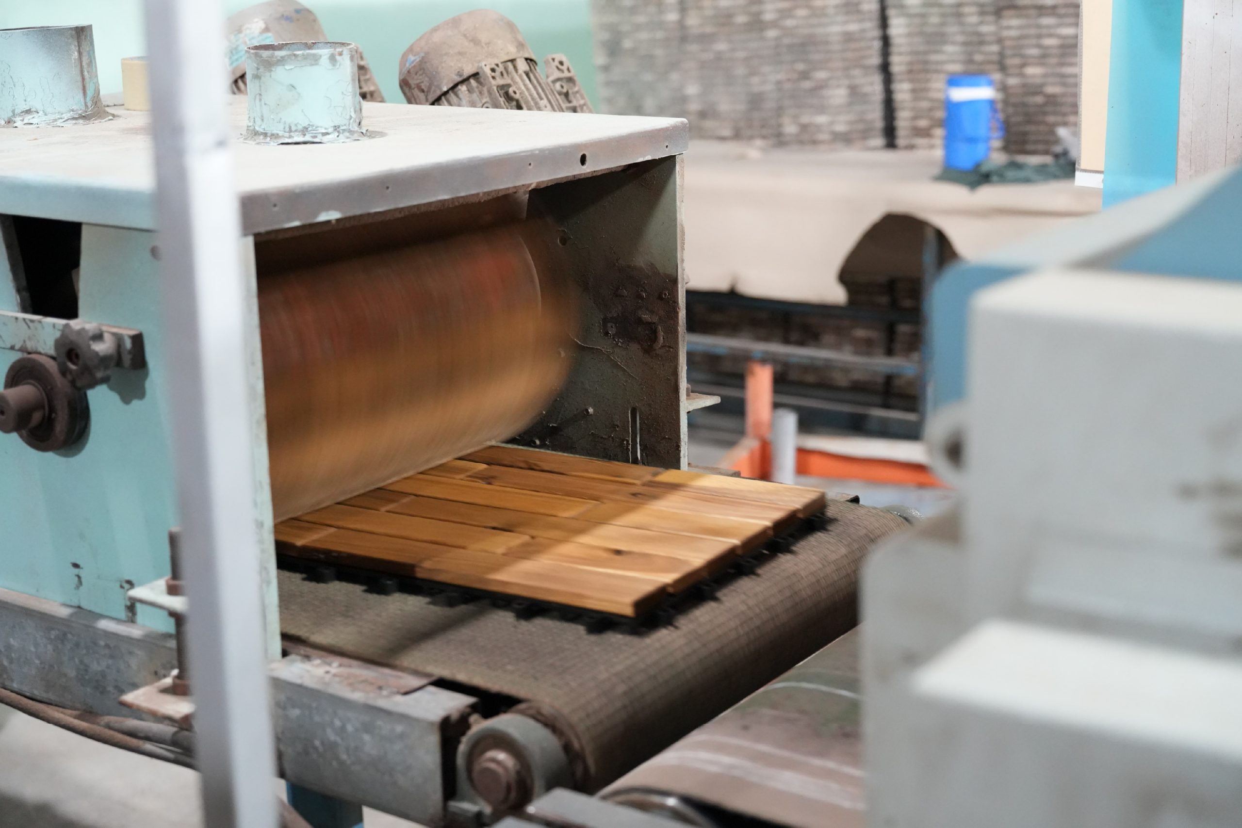 Wood deck tiles surface preparation at SSR Wood Factory